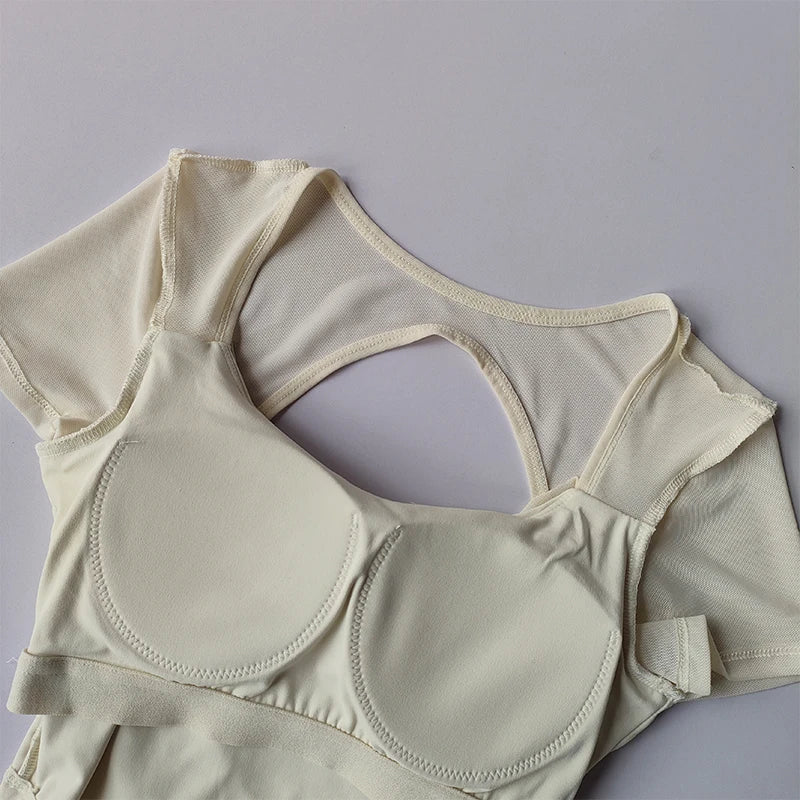 Cream colored padded yoga shirts for women featuring a stylish design and soft fabric