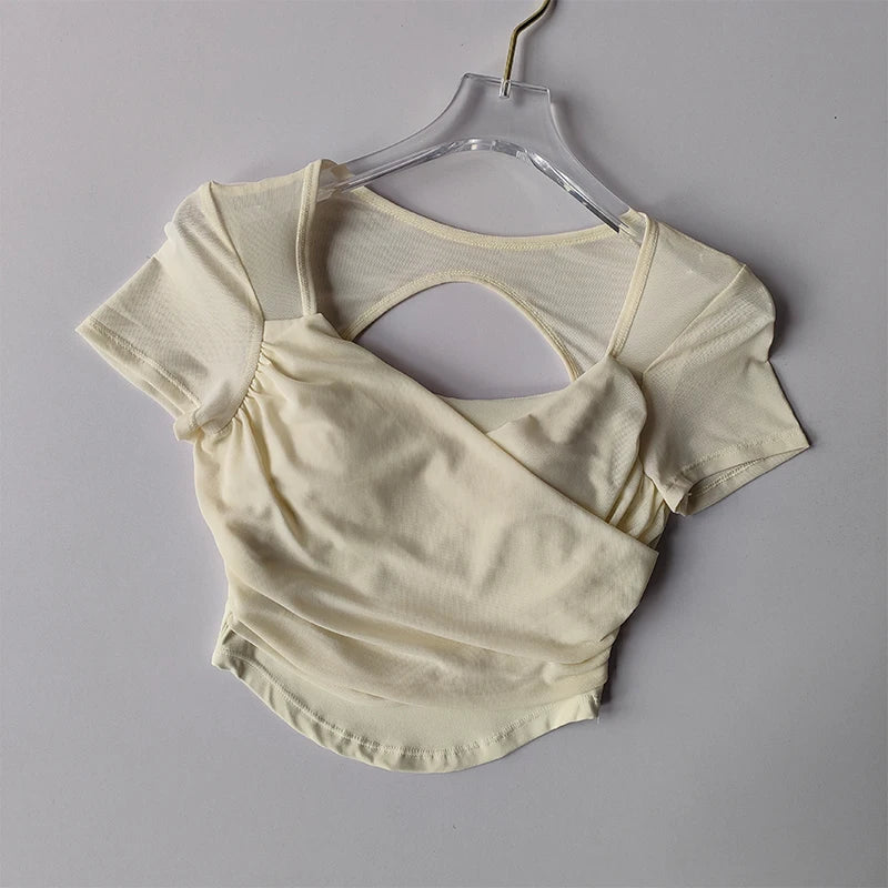 Cream Padded Yoga Shirts for Women with Cut-Out Back Detail for Stylish Comfort