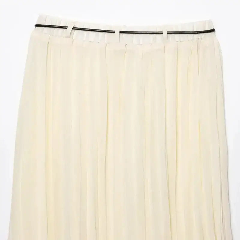 Cream pleated chiffon midi skirt with a black waistband detail from The Lady's Haven Boutique