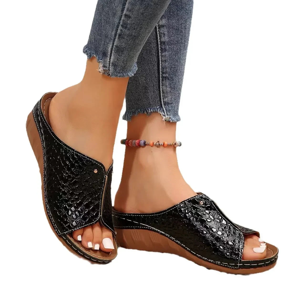 Plus size gladiator sandals in black with textured upper and low wedge heel from The Lady's Haven Boutique