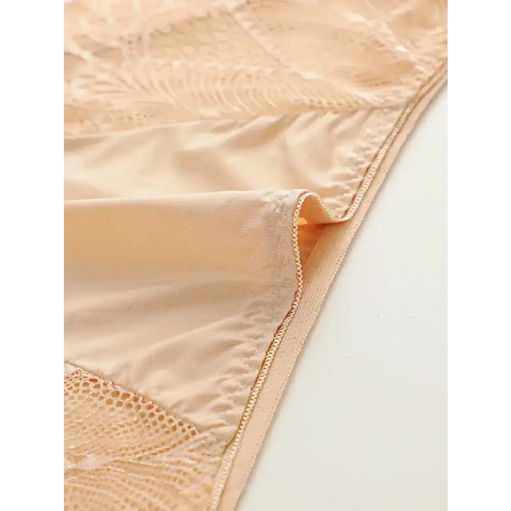 Beige plus size lace underwear for women featuring delicate lace and smooth fabric detailing