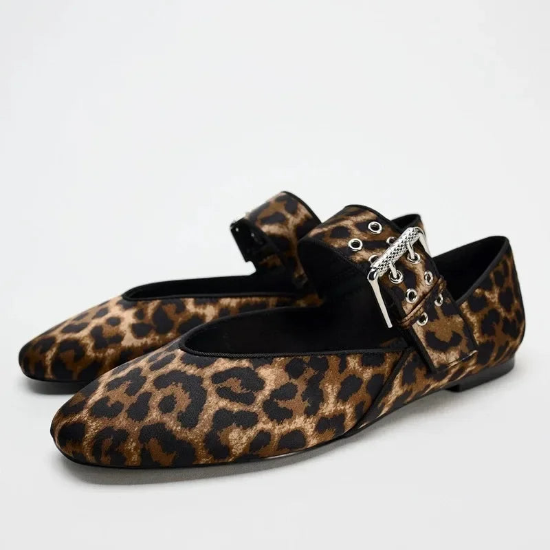 Leopard print pointed toe flats with decorative buckle from The Lady's Haven Boutique