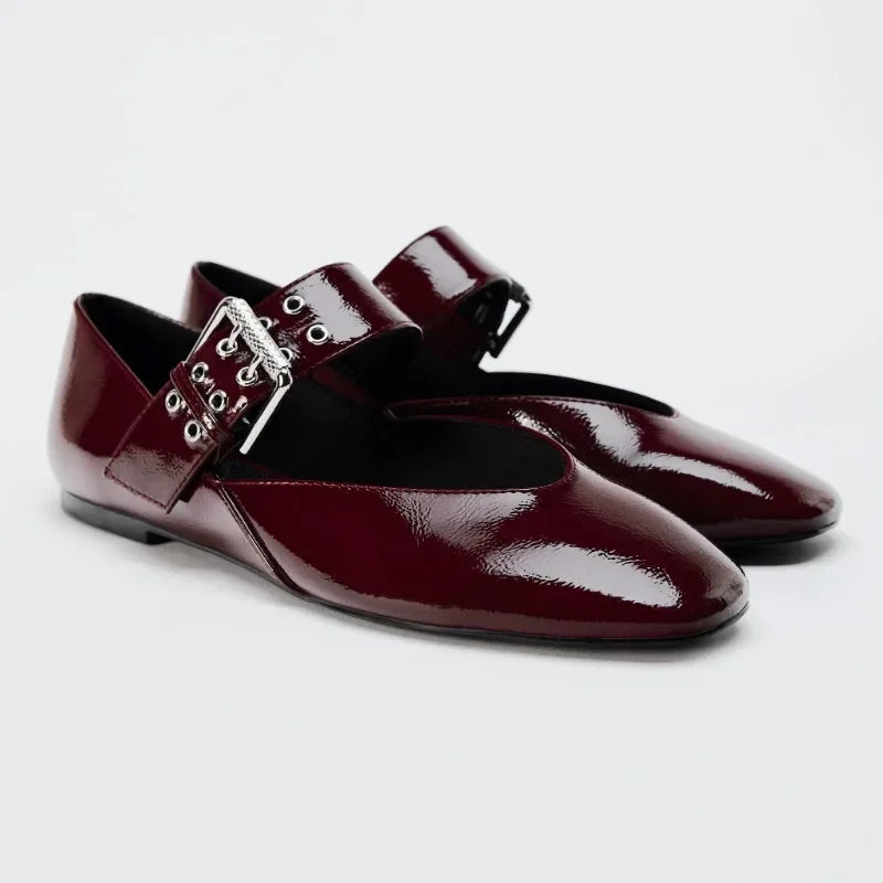 The Lady's Haven Boutique burgundy patent leather pointed toe flats with buckle strap detailing