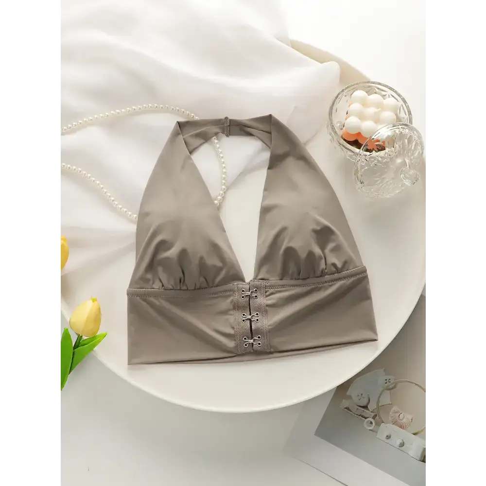 Taupe push up bralette no underwire with front hook closure displayed on white surface