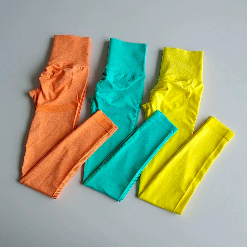 Colorful push up leggings for women in orange, turquoise, and yellow for a stylish workout look