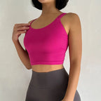 Pink push up sports bras for women with adjustable straps and cropped design for comfort and style