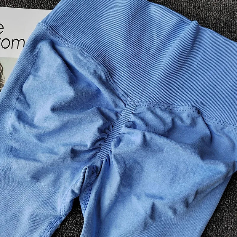 Light blue quick dry sport leggings with gathered waistband for a comfortable fit during workouts