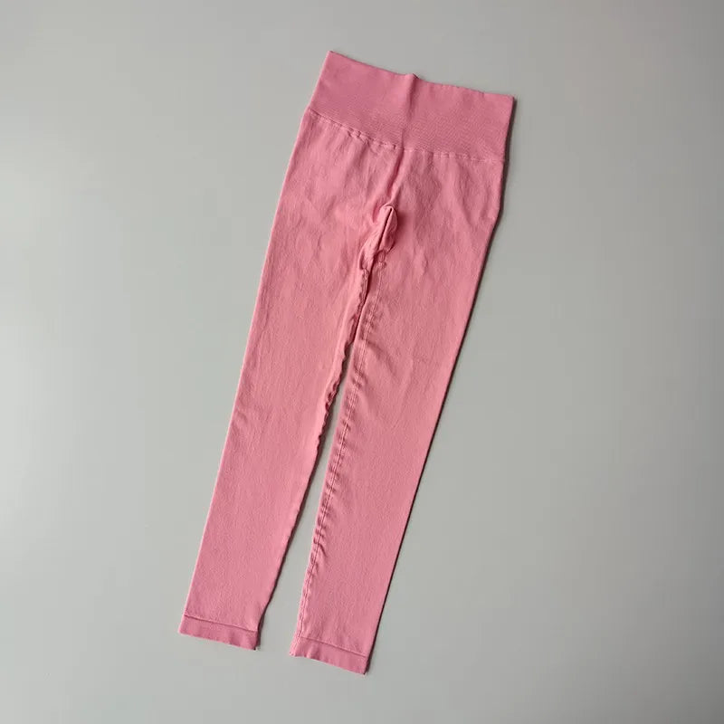 Pink quick dry sport leggings with a high waistband for comfort and flexibility during workouts