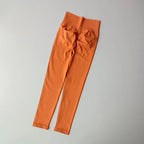 Orange quick dry sport leggings from The Lady's Haven Boutique, designed for comfort and performance