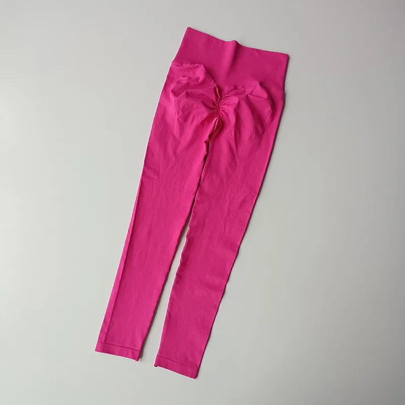 Bright pink quick dry sport leggings with comfortable waistband for active wear