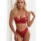 Model wearing a red two piece lace lingerie outfit with floral details and matching panties