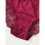 Close-up of burgundy two piece lace lingerie outfit with floral lace and smooth fabric detailing