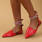 Red flat heel rhinestone ankle strap sandals from The Lady's Haven Boutique with pointed toes