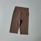Ribbed cycling yoga gym shorts for women in a soft brown color, perfect for workouts and casual wear