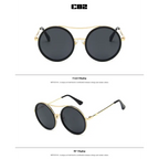 Round sunglasses with designer flair featuring a stylish gold frame and dark lenses