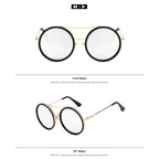 Round sunglasses with designer flair featuring a vintage and modern aesthetic in black and gold