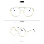 Round sunglasses with designer flair featuring a vintage-inspired gold frame and clear lenses