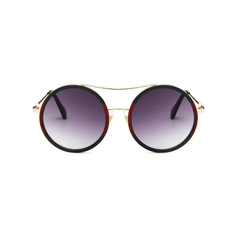 Chic round sunglasses with designer flair featuring gradient lenses and stylish frame at The Lady's Haven Boutique