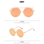 Trendy pink round sunglasses with designer flair featuring a unique vintage and modern style
