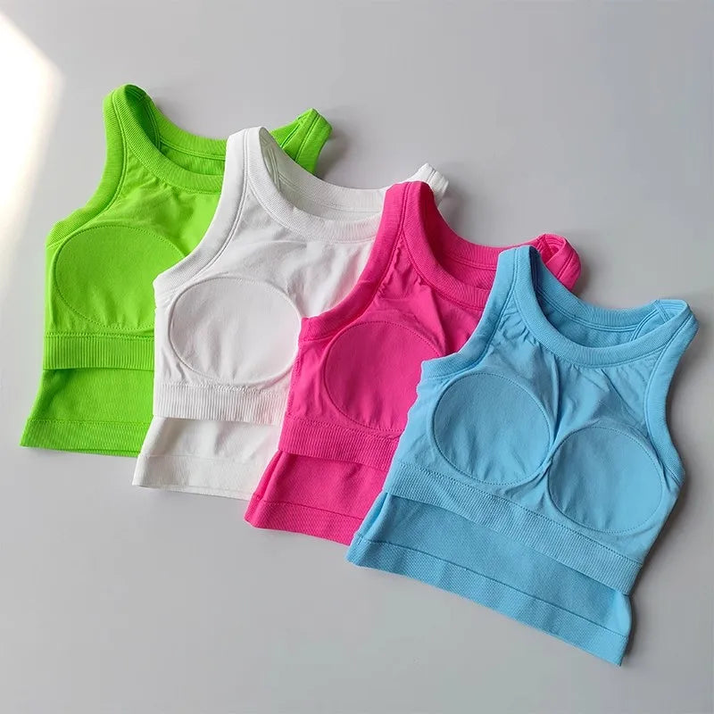 Colorful seamless sports vest for women available in green, white, pink, and blue for active wear