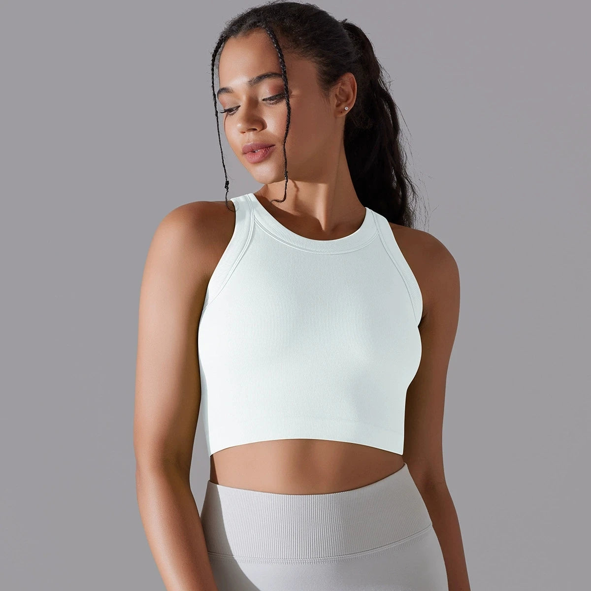 Light green seamless sports vest for women with a cropped design for comfort and mobility