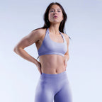 Seamless yoga suit for women in light purple, featuring a sports bra and high-waisted leggings
