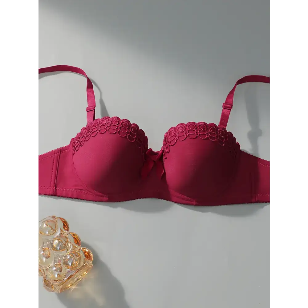 Sexy embroidered flower bra in deep pink with delicate floral lace detailing and adjustable straps