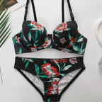Sexy floral bra and panty set with black base and red white flower print from The Lady's Haven Boutique