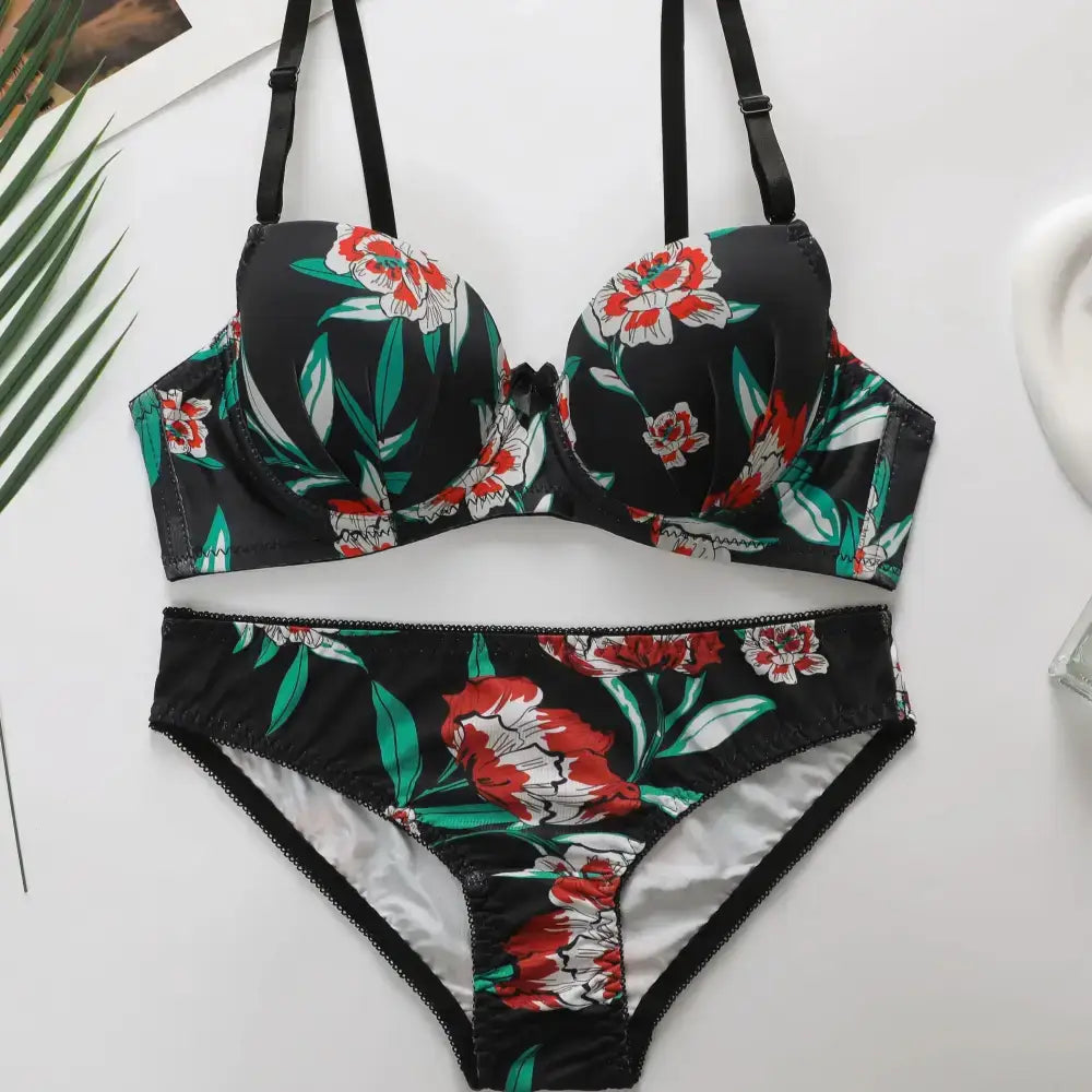 Sexy floral bra and panty set with black base and red white flower print from The Lady's Haven Boutique