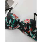 Black sexy floral bra and panty set with red and white flowers and green leaves from The Lady's Haven Boutique