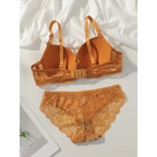 Orange sexy lace bra and panty set with floral lace design and adjustable straps