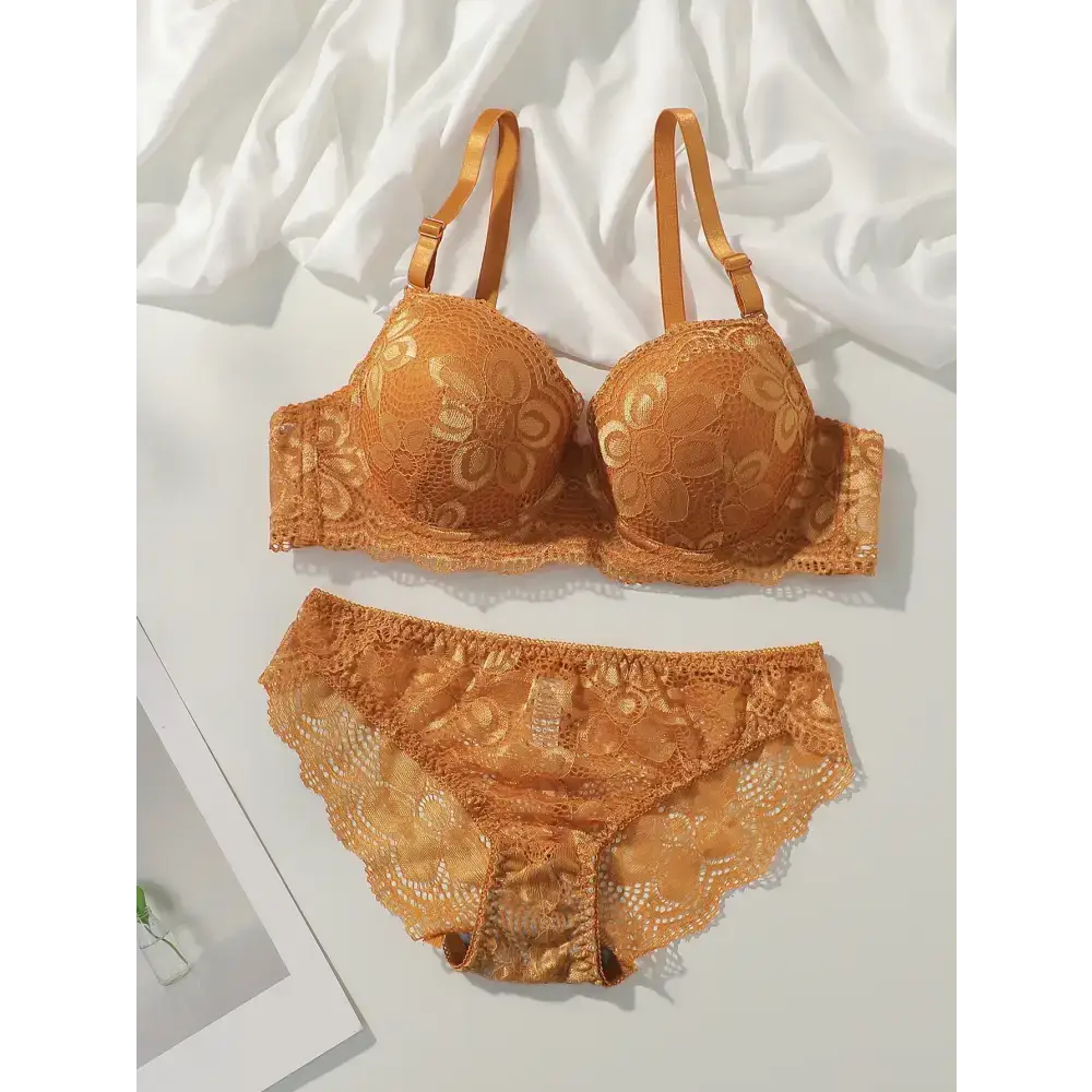 Sexy lace bra and panty set in golden brown with floral lace design and adjustable straps