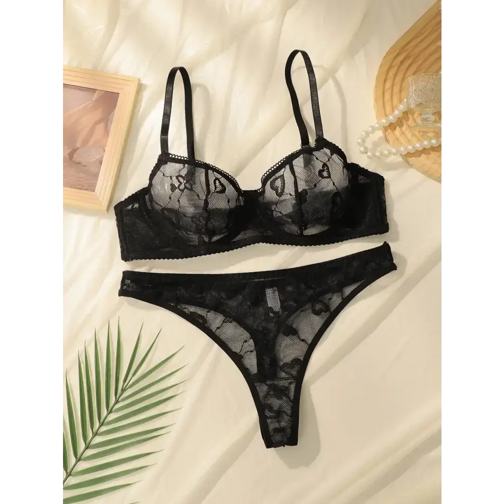 Sexy lace lingerie set in black with floral lace design and adjustable straps from The Lady's Haven Boutique