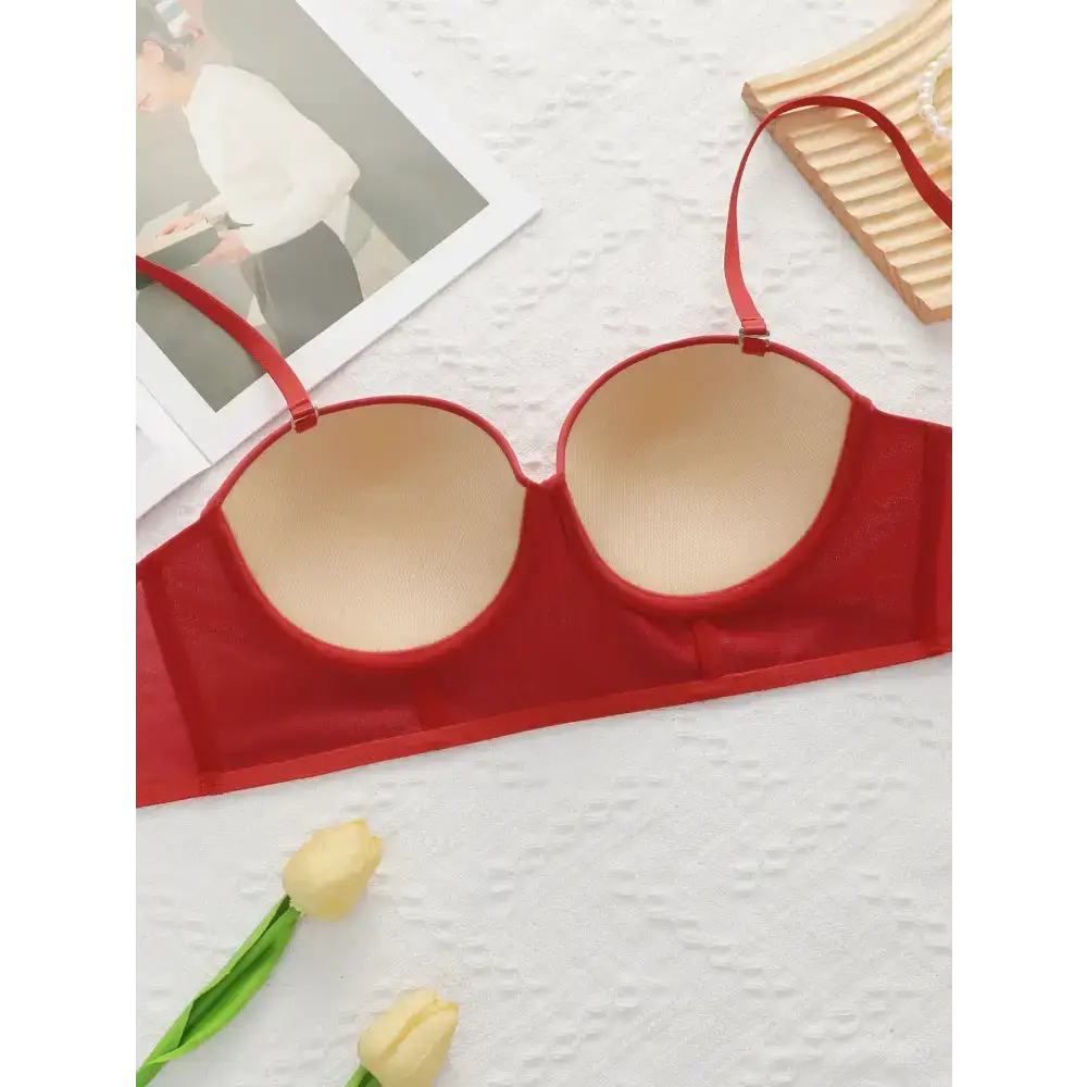 Sexy red bra and panty set featuring padded cups and adjustable straps by The Lady's Haven Boutique
