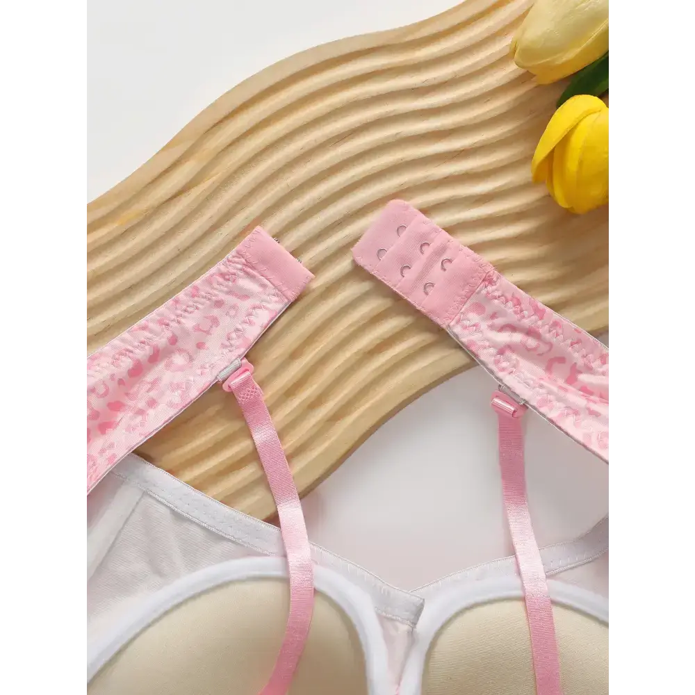 Pink and white sexy underwire bra and panty set with adjustable straps and hook closure