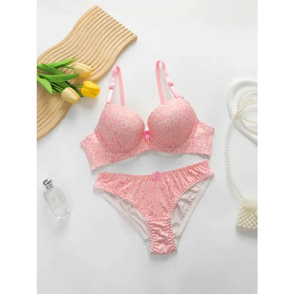 The Lady's Haven Boutique pink sexy underwire bra and panty set with subtle leopard print and decorative bows