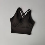 Black shockproof crop top for women with crisscross straps and comfortable fit