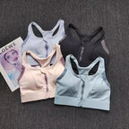 Shockproof padded gym bra for women in four colors: light blue, pink, black, and lavender
