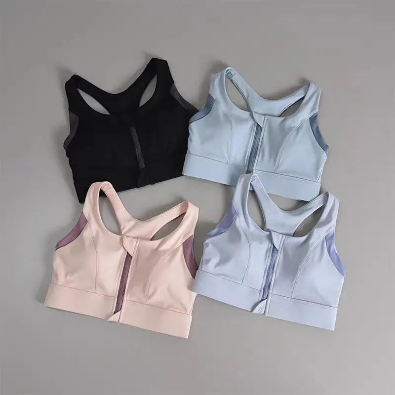 Set of four shockproof padded gym bras for women in black, light blue, pastel pink, and pale blue