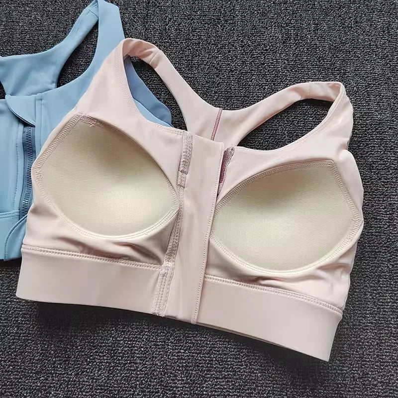 Two colors of shockproof padded gym bra for women with supportive design for workouts