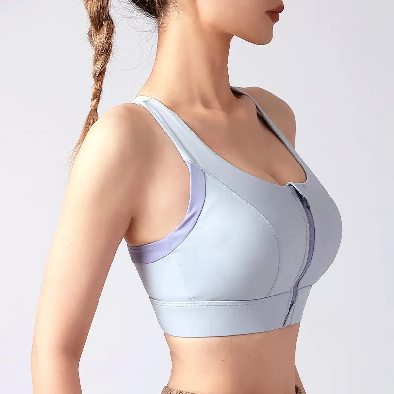 Light blue shockproof padded gym bra for women designed for comfort and support during workouts