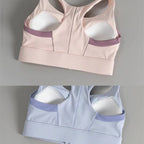 Shockproof padded gym bra for women in pink and blue with breathable design for comfort and support