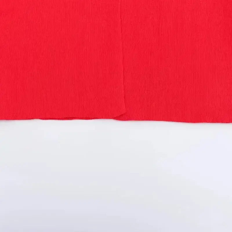 Close-up of red fabric detail of casual fashion cropped jacket from The Lady's Haven Boutique