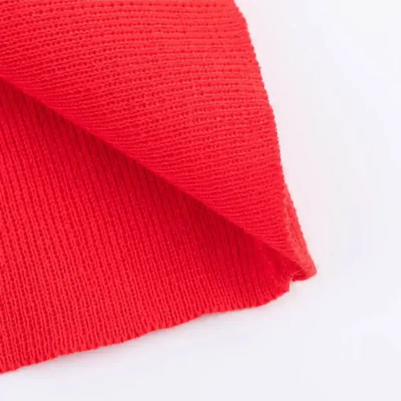 Close up of red knitted fabric detail for casual fashion cropped jacket from The Lady's Haven Boutique