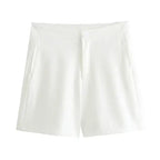 White tailored shorts from The Lady's Haven Boutique for a summer office vest and shorts outfit