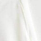 Close-up detail of soft white fabric for summer office vest and shorts outfit from The Lady's Haven Boutique