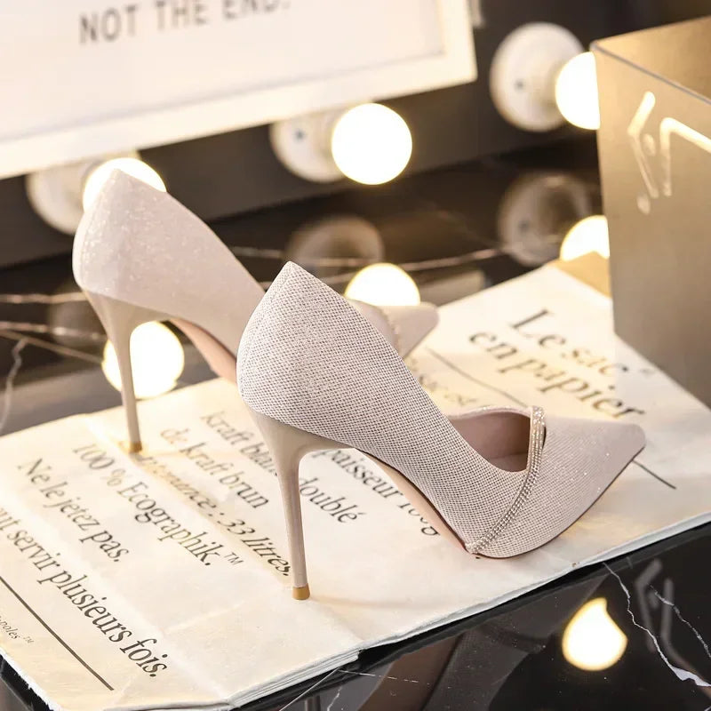 Elegant beige single strap stiletto heels with pointed toes from The Lady's Haven Boutique