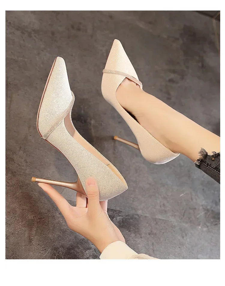 Elegant beige single strap stiletto heels with pointed toes and slim high heels