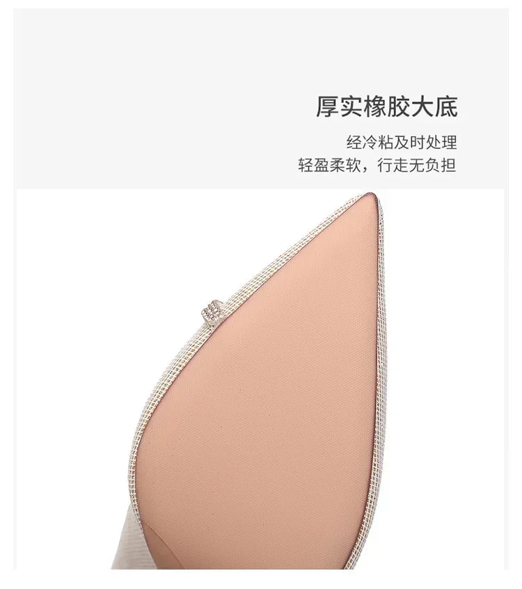 Close-up of pointed toe sole on single strap stiletto heels with soft rubber bottom