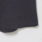 Close-up of black fabric detail on sleeveless backless midi dress from The Lady's Haven Boutique